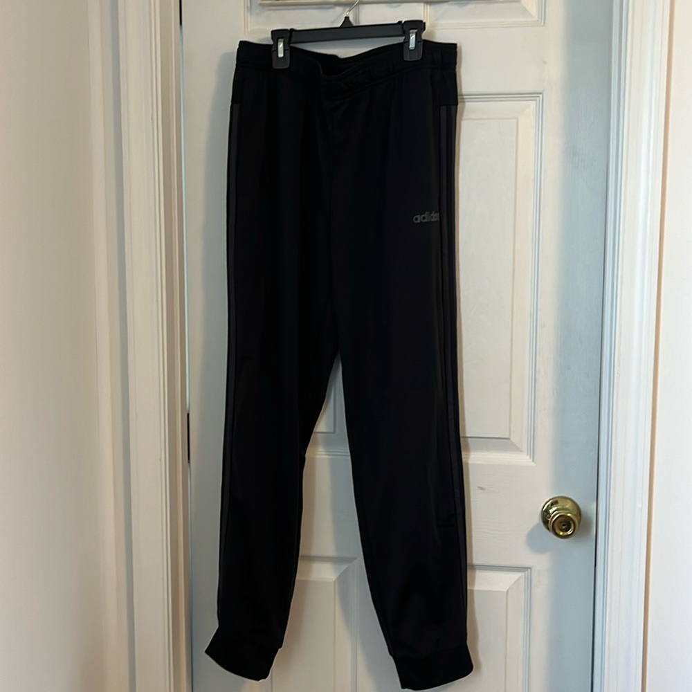 Used black Adidas joggers for men. Size L.